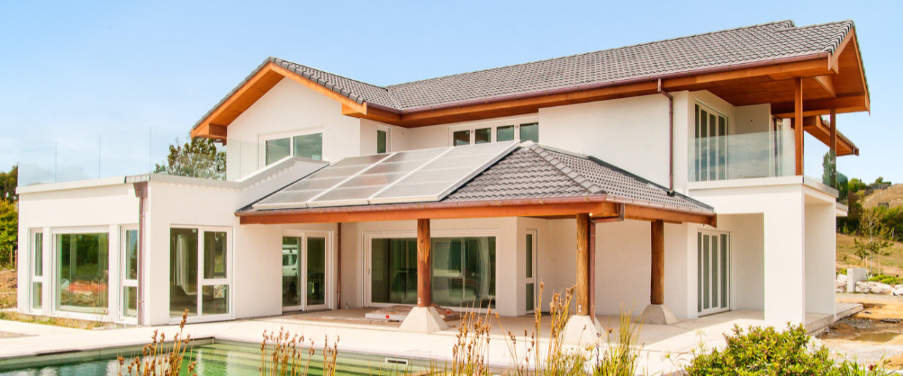 house with big windows and with pool